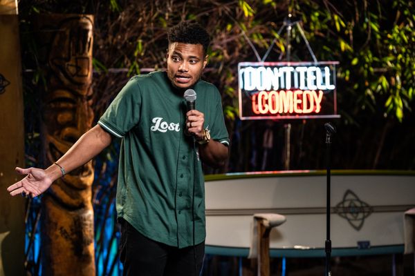 Comedian at a Don't Tell Comedy Show.